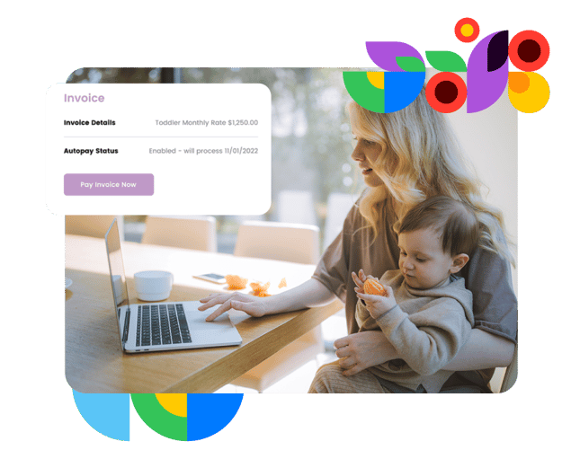 Mother using childcare software while holding her baby