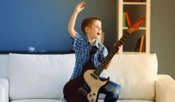 kid with guitar