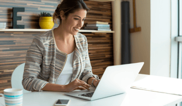 woman at desk on laptop - building email marketing campaigns