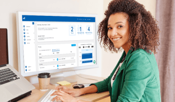 woman using childcarecrm on computer