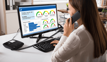 woman on phone while using crm+