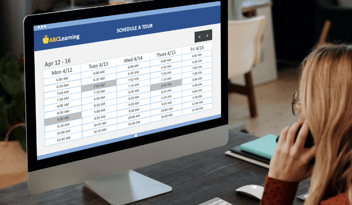blonde woman on cell phone, looking at crm online tour scheduler tool