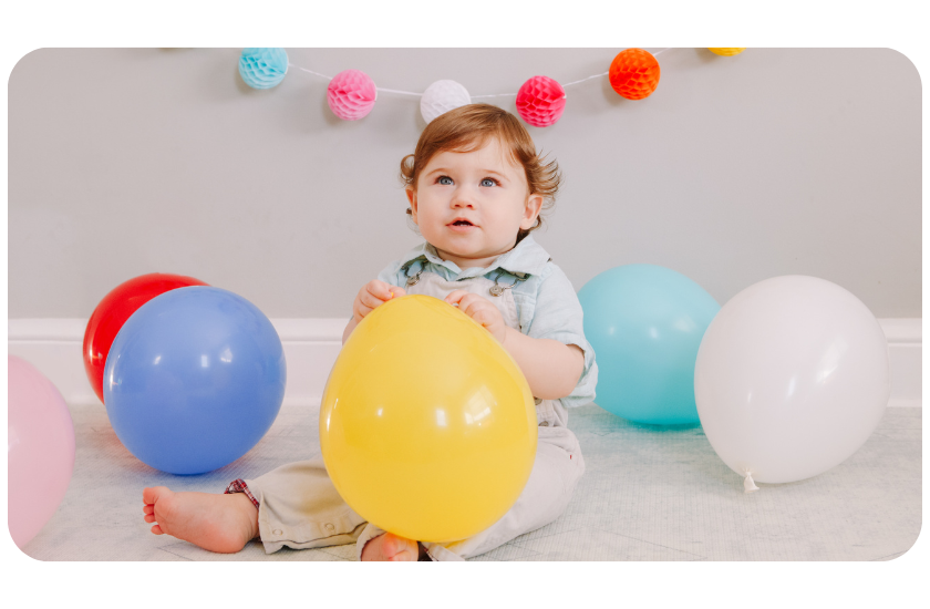 child with balloons 