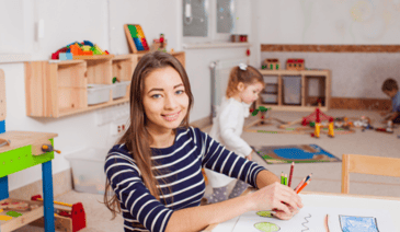 teacher smiling at camera