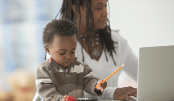 woman on laptop, child with pencil