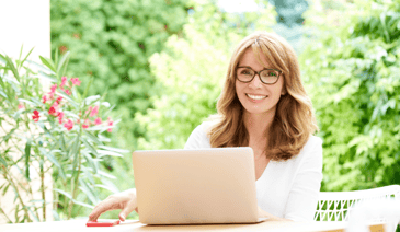 happy woman on laptop - digital options