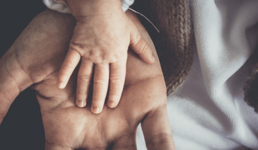 parent and child holding hands