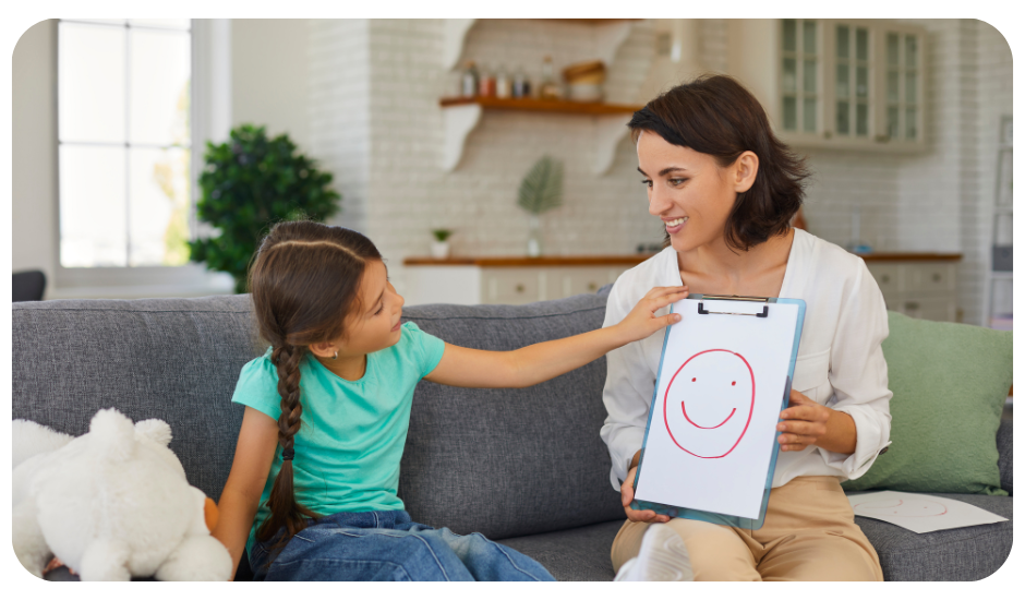 Teacher with child - discussing feelings